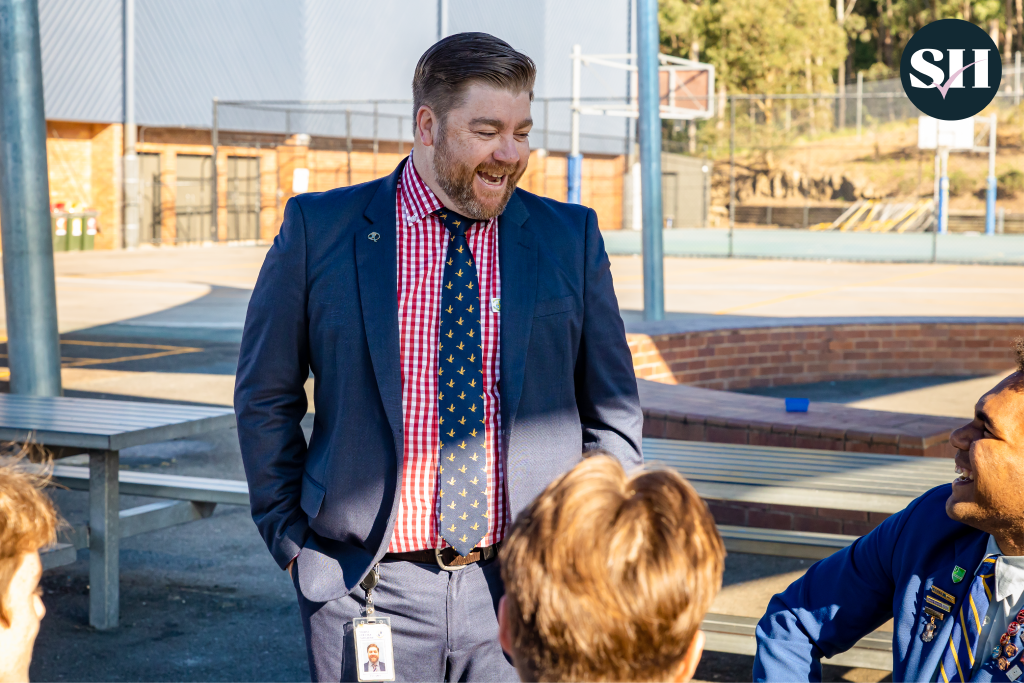 Teacher Laughing With Students